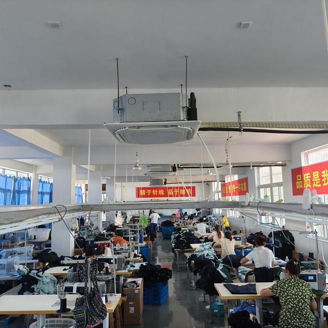 服饰江西生产基地顺利投产CQ9电子app浙江金裁(图1)